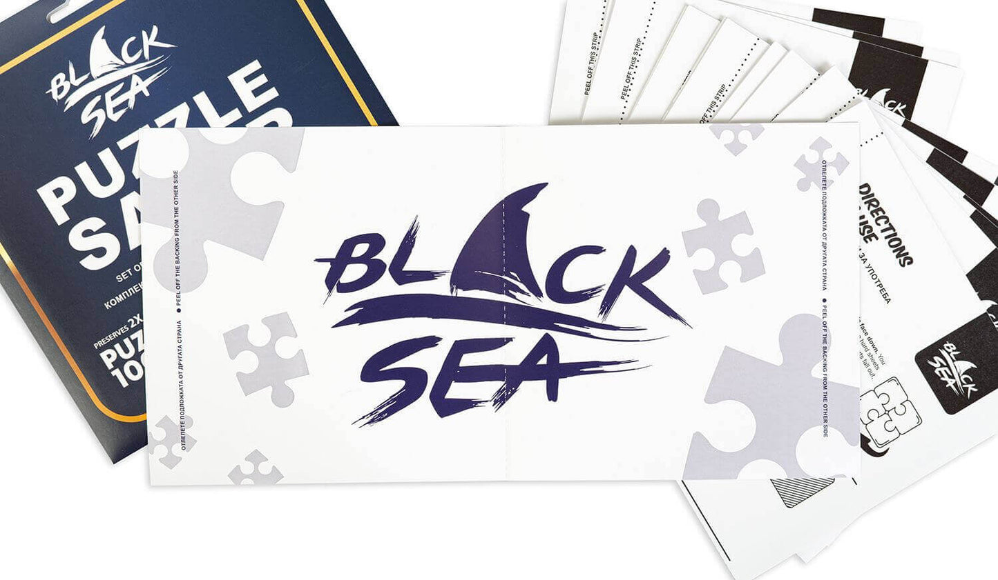 Black Sea Puzzles - Puzzle Saver, Set of puzzle saver stickers by Black Sea. Contents: 12 pieces of adhesive stickers measuring 19 x 38 cm each; Instructions. The stickers can secure 2 puzzles with 1000 pieces, 1 puzzle with 2000 pieces, or 4 puzzles with