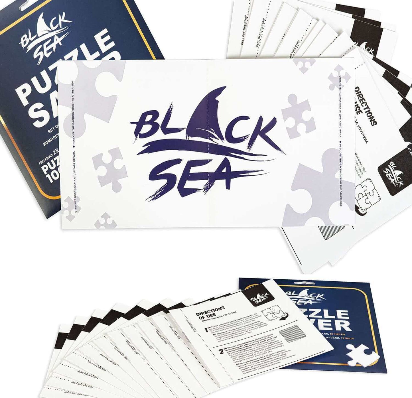 Black Sea Puzzles - Puzzle Saver, Set of puzzle saver stickers by Black Sea. Contents: 12 pieces of adhesive stickers measuring 19 x 38 cm each; Instructions. The stickers can secure 2 puzzles with 1000 pieces, 1 puzzle with 2000 pieces, or 4 puzzles with